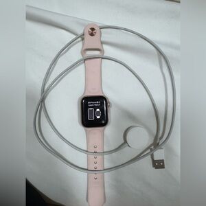 Apple Watch Series 4 with Soft Pink Band and Charger. Preowned good condition